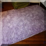 D03. Purple shag rug 7'6” x 5'4” 